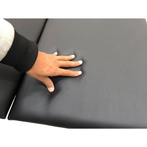Manual gynecological examination table with storage unit